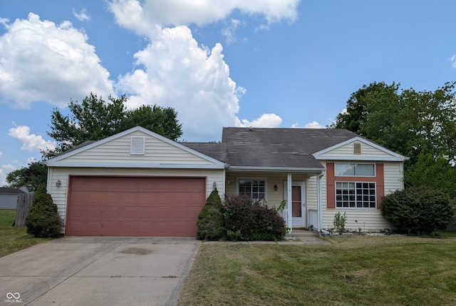 8454 Saxon Ct, Columbus, IN 47201 - view of front of home featuring a front yard, driveway, and a garage