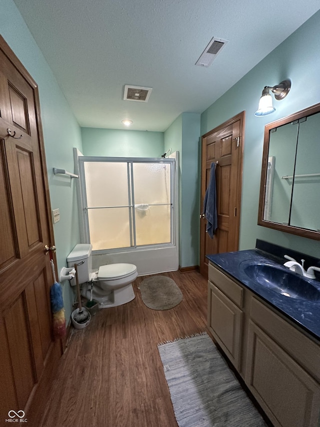 2765 S 1200 E, Zionsville, IN 46077 - full bathroom with wood finished floors, vanity, enclosed tub / shower combo, and a textured ceiling