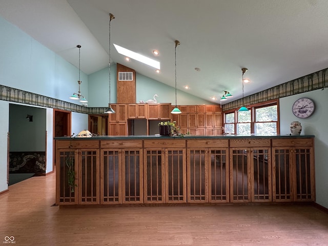 2765 S 1200 E, Zionsville, IN 46077 - misc room with light wood-type flooring, a skylight, and high vaulted ceiling