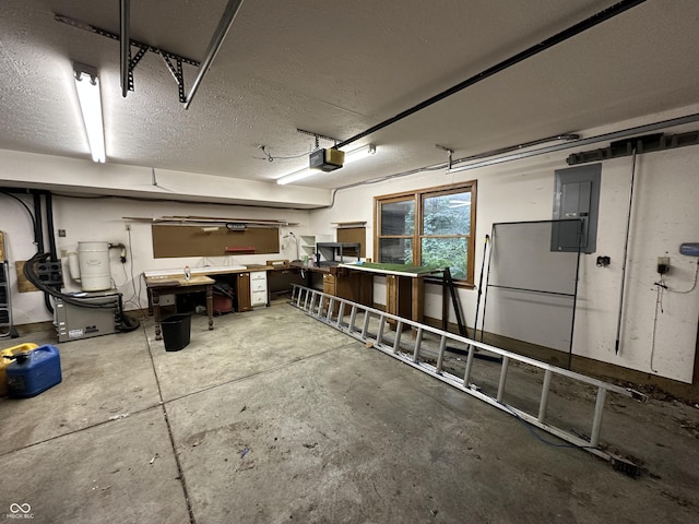 2765 S 1200 E, Zionsville, IN 46077 - garage with electric panel, a garage door opener, and a workshop area