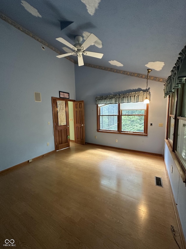 2765 S 1200 E, Zionsville, IN 46077 - empty room featuring light wood-style floors, a ceiling fan, and high vaulted ceiling