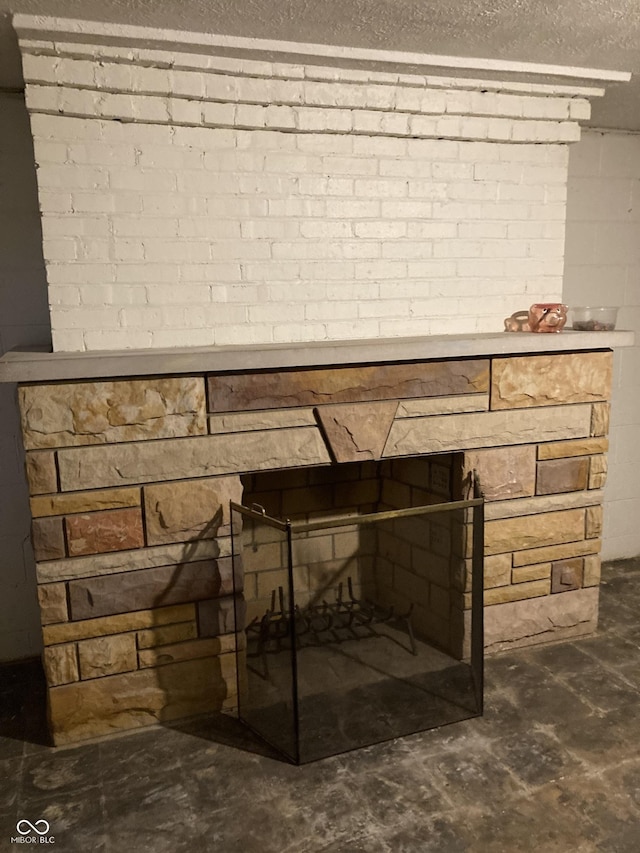 1016 N Mitchner Ave, Indianapolis, IN 46219 - detailed view of concrete block wall, concrete floors, and a textured ceiling