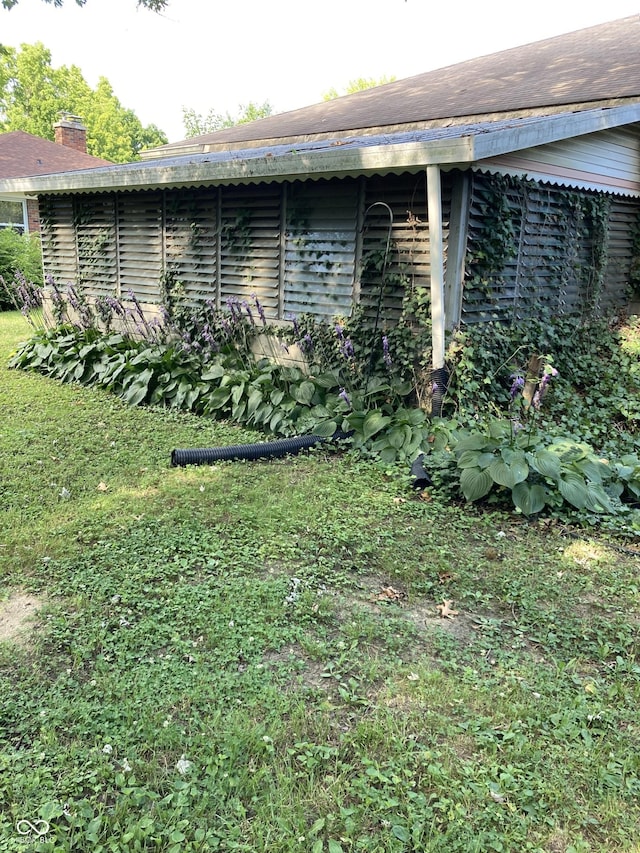 1016 N Mitchner Ave, Indianapolis, IN 46219 - view of side of property featuring a chimney