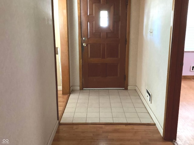 1016 N Mitchner Ave, Indianapolis, IN 46219 - corridor featuring light wood-type flooring