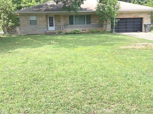 1016 N Mitchner Ave, Indianapolis, IN 46219 - single story home with concrete driveway, an attached garage, a front yard, and stone siding