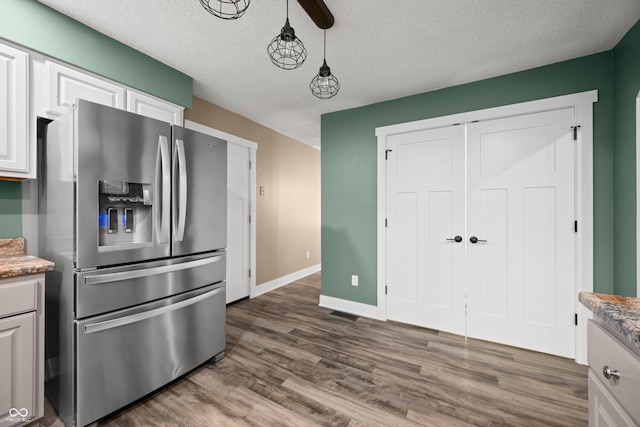 173 W Lakeview Dr, Nineveh, IN 46164 - kitchen featuring stainless steel fridge with ice dispenser, dark wood finished floors, a textured ceiling, and pendant lighting