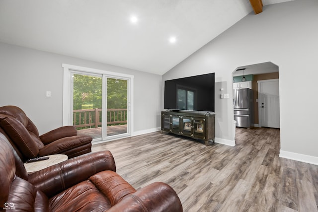173 W Lakeview Dr, Nineveh, IN 46164 - living room with wood finished floors, high vaulted ceiling, arched walkways, beam ceiling, and recessed lighting