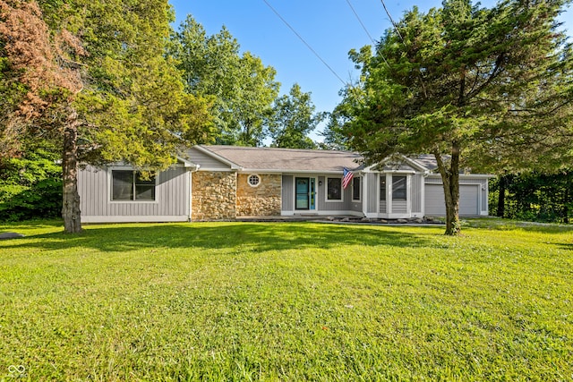 173 W Lakeview Dr, Nineveh, IN 46164 - ranch-style house featuring a garage, a front lawn, and stone siding