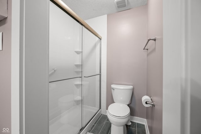 173 W Lakeview Dr, Nineveh, IN 46164 - bathroom featuring a stall shower and a textured ceiling