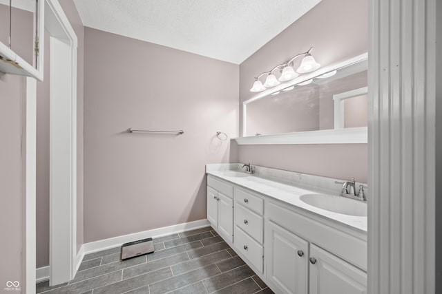 173 W Lakeview Dr, Nineveh, IN 46164 - full bath with double vanity, wood tiled floors, and a textured ceiling