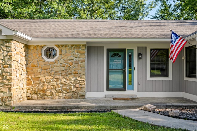 173 W Lakeview Dr, Nineveh, IN 46164 - entrance to property featuring stone siding, roof with shingles, and a porch