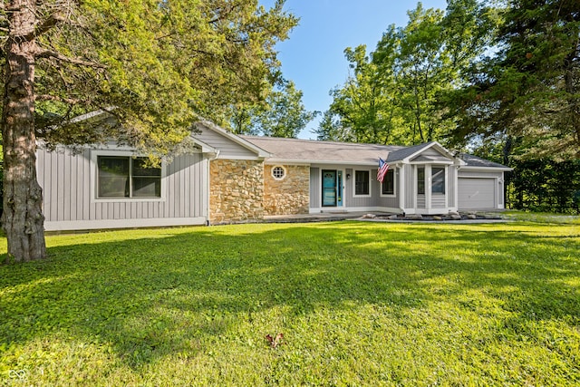 173 W Lakeview Dr, Nineveh, IN 46164 - ranch-style house featuring a garage, stone siding, and a front lawn