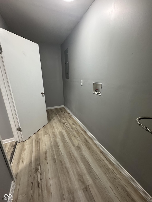 67 N Devon Ave, Indianapolis, IN 46219 - washroom featuring hookup for a washing machine, electric panel, and light wood finished floors