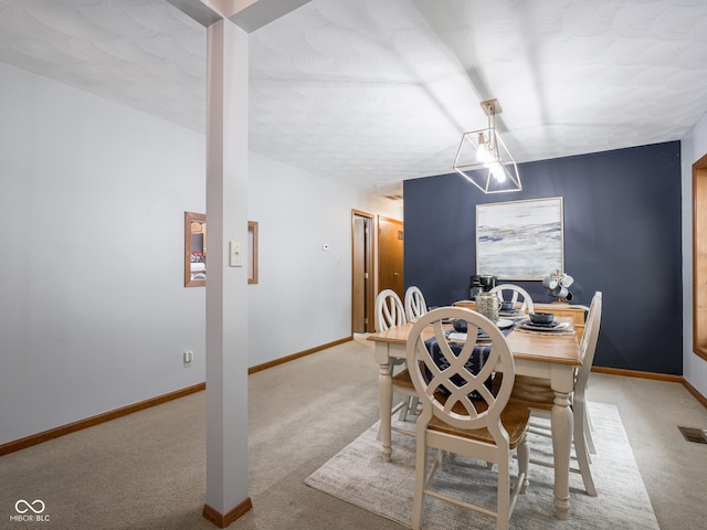 479 Raintree Dr, Danville, IN 46122 - carpeted dining room featuring baseboards