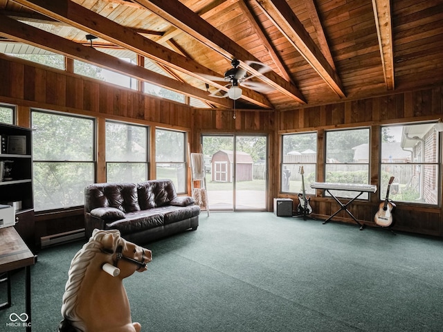 479 Raintree Dr, Danville, IN 46122 - carpeted living room featuring wood ceiling, wooden walls, a ceiling fan, healthy amount of natural light, and a baseboard heating unit