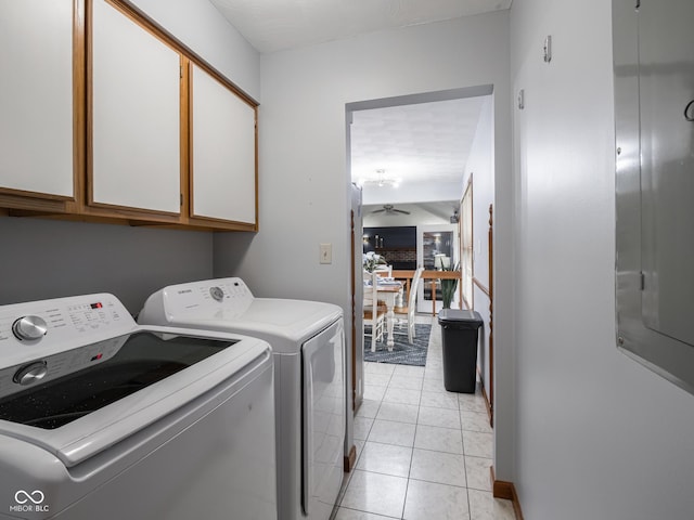 479 Raintree Dr, Danville, IN 46122 - laundry room featuring cabinet space, washer and clothes dryer, light tile patterned floors, and ceiling fan