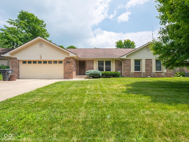 479 Raintree Dr, Danville, IN 46122 - ranch-style home featuring a garage, driveway, brick siding, and a front yard
