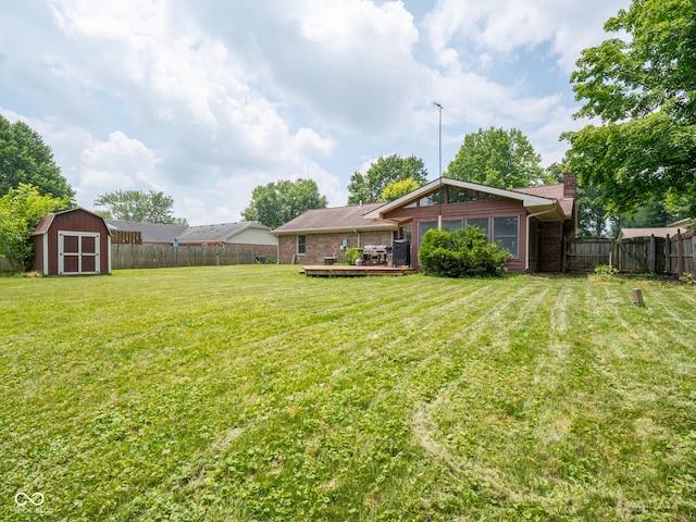 479 Raintree Dr, Danville, IN 46122 - fenced backyard featuring a storage unit and a deck