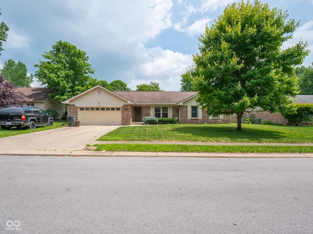 479 Raintree Dr, Danville, IN 46122 - single story home featuring brick siding, a garage, driveway, and a front lawn