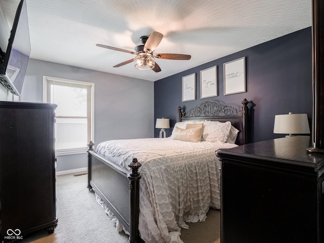 479 Raintree Dr, Danville, IN 46122 - bedroom featuring carpet floors and a ceiling fan