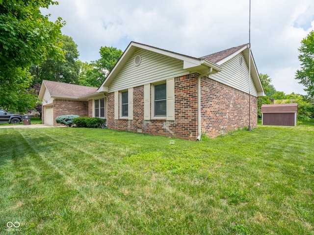 479 Raintree Dr, Danville, IN 46122 - view of front facade with brick siding, an attached garage, a front lawn, and a shed