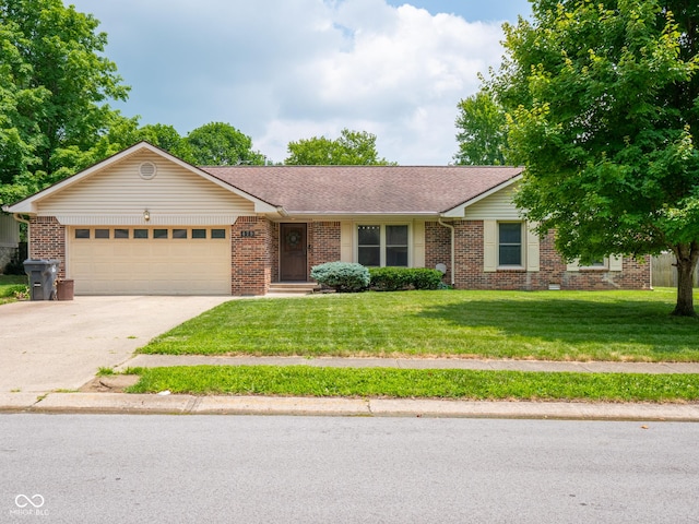 479 Raintree Dr, Danville, IN 46122 - ranch-style house with concrete driveway, brick siding, a garage, a front lawn, and roof with shingles