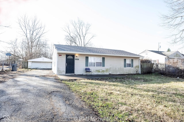 5737 E 22nd St, Indianapolis, IN 46218 - view of front of house with a garage and an outdoor structure