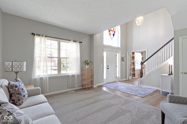 441 Viburnum Run, Westfield, IN 46074 - entryway with healthy amount of natural light, stairway, and wood finished floors