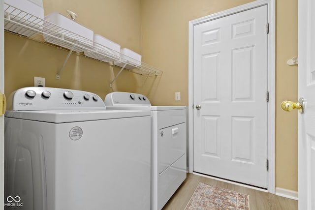 441 Viburnum Run, Westfield, IN 46074 - laundry room with washer and dryer and light wood finished floors