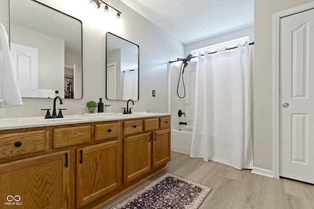 441 Viburnum Run, Westfield, IN 46074 - full bathroom with wood finished floors, double vanity, and shower / bath combo