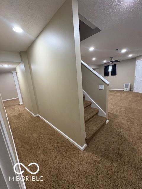 441 Viburnum Run, Westfield, IN 46074 - hall with carpet floors, a textured ceiling, stairs, and recessed lighting