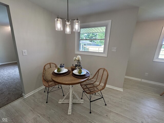 2692 Meadowlark Ln, Columbus, IN 47201 - dining room with light wood-type flooring and baseboards
