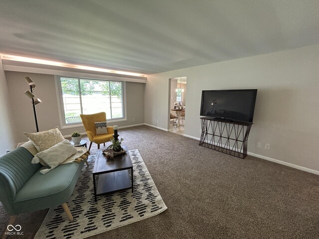2692 Meadowlark Ln, Columbus, IN 47201 - carpeted living area featuring baseboards