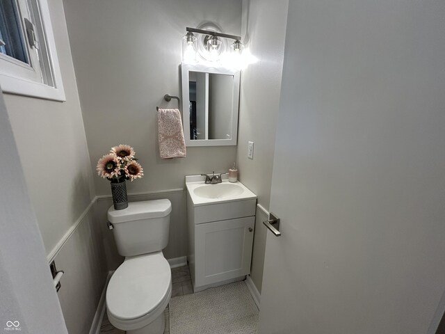 2692 Meadowlark Ln, Columbus, IN 47201 - half bathroom with vanity and tile patterned floors