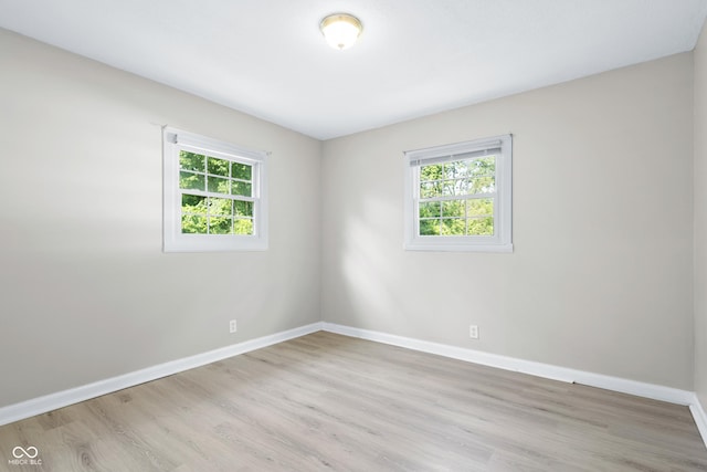 3945 N Ridgeview Dr, Indianapolis, IN 46226 - unfurnished room featuring plenty of natural light and light wood-type flooring