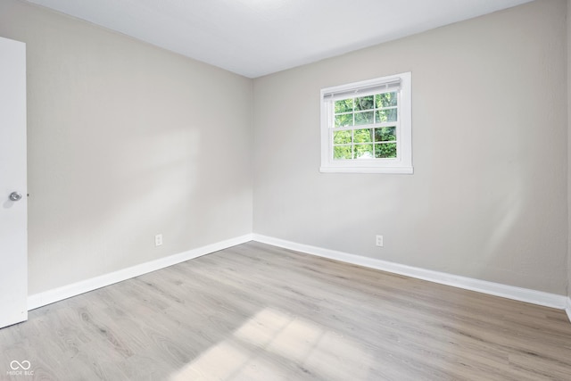 3945 N Ridgeview Dr, Indianapolis, IN 46226 - spare room featuring baseboards and wood finished floors