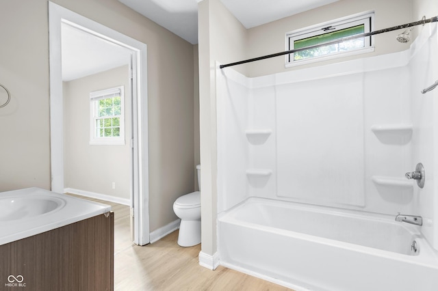 3945 N Ridgeview Dr, Indianapolis, IN 46226 - bathroom featuring shower / tub combination, vanity, and wood finished floors