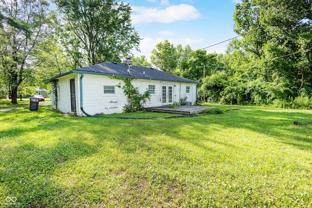 3945 N Ridgeview Dr, Indianapolis, IN 46226 - rear view of property featuring french doors, a chimney, a lawn, and a wooden deck