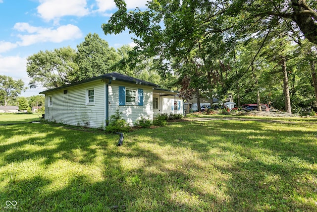 3945 N Ridgeview Dr, Indianapolis, IN 46226 - view of property exterior featuring a lawn