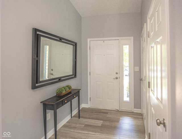 17019 Flinchum Way E, Noblesville, IN 46062 - entrance foyer with wood finished floors and baseboards