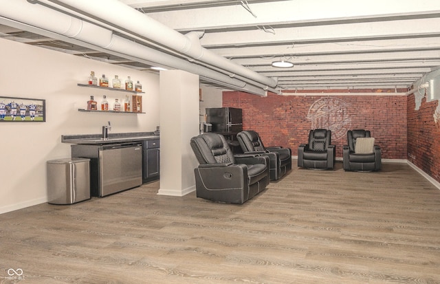 17019 Flinchum Way E, Noblesville, IN 46062 - indoor wet bar with brick wall, freestanding refrigerator, light wood-style flooring, and refrigerator