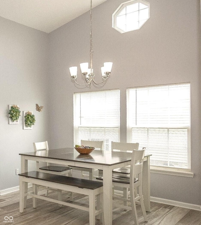 17019 Flinchum Way E, Noblesville, IN 46062 - dining room with a chandelier and wood finished floors
