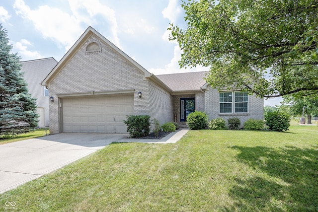 17019 Flinchum Way E, Noblesville, IN 46062 - ranch-style house with brick siding, an attached garage, concrete driveway, and a front yard