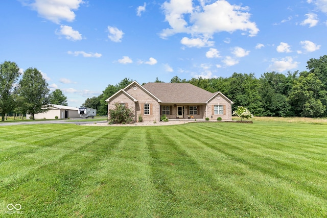 606 S Grange Hall Rd, Hanover, IN 47243 - ranch-style house with a front lawn, brick siding, and a porch