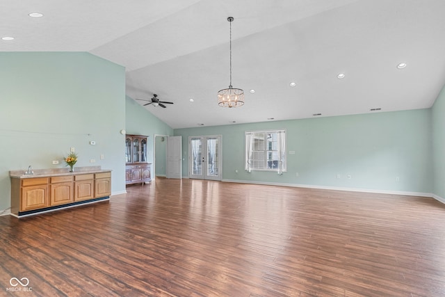 606 S Grange Hall Rd, Hanover, IN 47243 - unfurnished living room with wood finished floors, ceiling fan, a chandelier, high vaulted ceiling, and recessed lighting