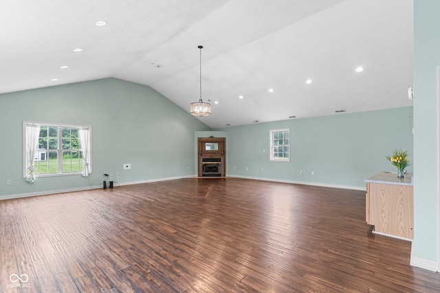 606 S Grange Hall Rd, Hanover, IN 47243 - unfurnished living room featuring vaulted ceiling, wood finished floors, recessed lighting, a chandelier, and a fireplace