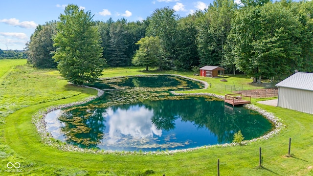 606 S Grange Hall Rd, Hanover, IN 47243 - view of swimming pool with an outbuilding, a water view, and a yard