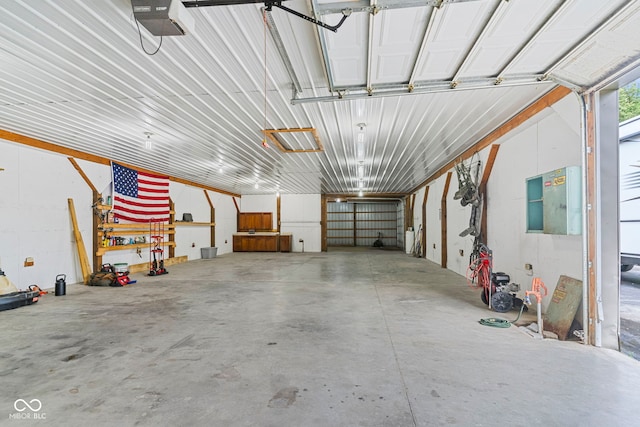 606 S Grange Hall Rd, Hanover, IN 47243 - garage featuring a garage door opener