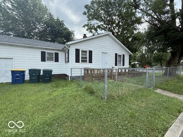1048 S Burlington Dr, Muncie, IN 47302 - view of front of home featuring a chimney