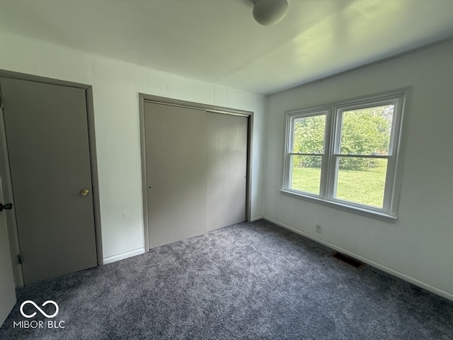 1914 E 23rd St, Muncie, IN 47302 - unfurnished bedroom with carpet flooring and a closet
